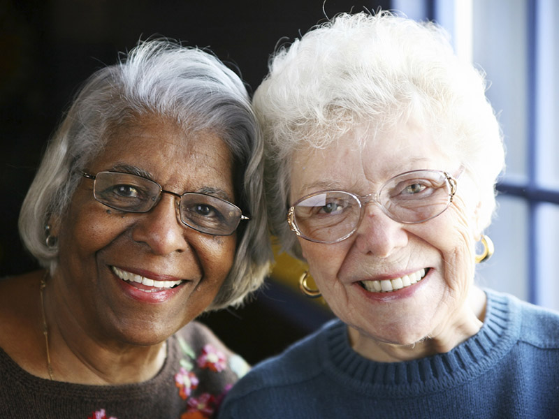 Two seniors smiling
